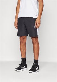 adidas Performance - TIRO 25 ESSENTIALS WOVEN - Korte sportsbukser - black/white Miniaturebillede 1