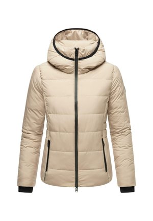 Veste matelassée beige avec capuche, fermeture éclair à l'avant, poches zippées noires et bordure noire autour de la capuche et des poignets.