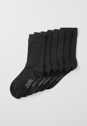 Schwarze Baumwollsocken, weiche Textur, gerippte Bündchen, sechs Paar gestapelt, mit subtiler Logo auf der Sohle. Klassisches Design für den täglichen Gebrauch.