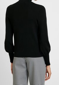 someday. Pullover - black