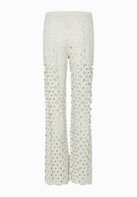 Pantaloni flared in pizzo bianco, con un motivo floreale ad uncinetto, vita elasticizzata e design a trama aperta, dal taglio morbido.
