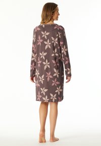 Long-sleeve nightdress in gray fabric with pink floral pattern, featuring a loose fit and knee-length silhouette, soft texture, and round neckline.