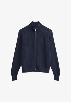 Cardigan zippé en jersey côtelé marine avec un col haut, présentant un motif de tricot texturé contrasté et des poignets et un ourlet ajustés.