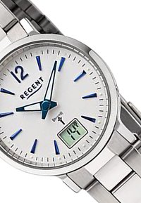 Montre en acier inoxydable argenté avec un cadran blanc, des index horaires bleus et un affichage numérique indiquant la température. Dispose de mains lumineuses.