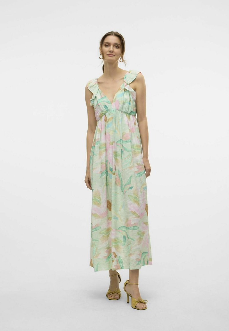 Abito lungo dai toni pastello con scollo arricciato e silhouette fluida, caratterizzato da un motivo floreale nelle tonalità di rosa e verde.