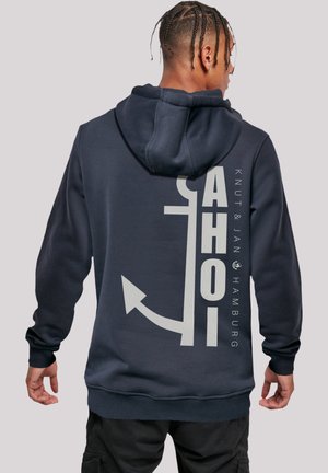Navy hoodie made of cotton blend, features large printed text and anchor design in light gray on back, with a drawstring hood and ribbed cuffs.