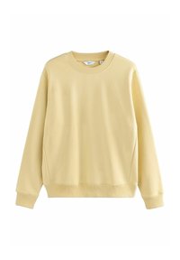Crèmegele katoenen sweatshirt, ronde hals, lange mouwen, ribgebreide manchetten en zoom, gladde textuur, iets oversized pasvorm.