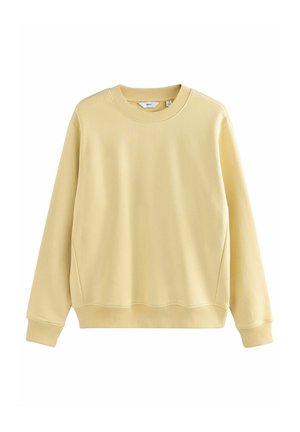 Crèmegele katoenen sweatshirt, ronde hals, lange mouwen, ribgebreide manchetten en zoom, gladde textuur, iets oversized pasvorm.