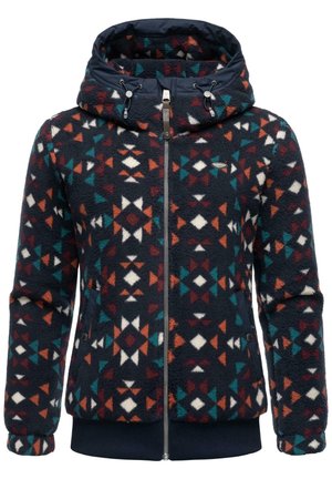 Veste polaire marine avec motif géométrique multicolore, fermeture éclair complète, capuche ajustable avec cordons de serrage et poches latérales.