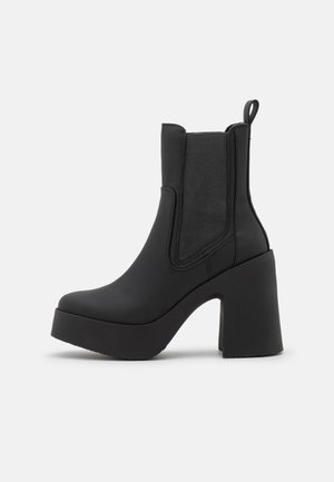 Bottines à talons hauts - black