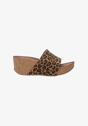 Leopard print wedge sandal with a wide strap, cork platform, and a textured sole. Brown and black pattern with a natural cork finish.