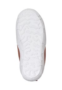 Weiße Gummisohle mit strukturierten Grip-Mustern, neben einem oberen Teil aus braunem Stoff. Die Sohle verfügt über ein wellenförmiges Design für besseren Halt.