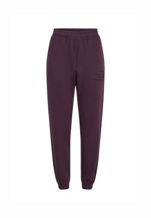 Paarse sweatpants met elastische tailleband, opgerolde enkels en zijzakken. Voorzien van de tekst "The Future Surf Society" in zwart aan de zijkant.