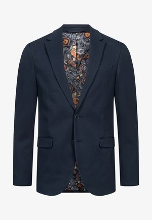 Granatowa marynarka o podwójnym zapięciu, z klapami w kształcie notcha, pojedynczą kieszenią na piersi oraz wyrazistą podszewką w kwiatowe i paisley wzory.
