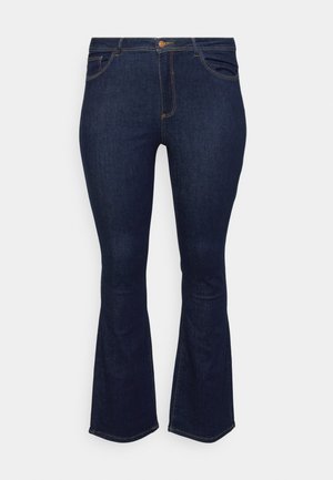 Mørkeblå, flagrende jeans laget av denim, med standard midje, frontlommer og kontrastnål, glatt tekstur.