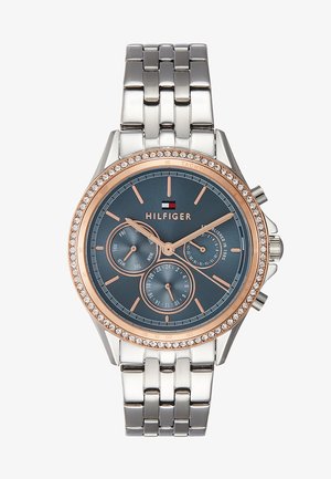 Silver stainless steel watch with a dark blue dial, rose gold accents, three sub-dials, and crystal accents on the bezel.