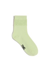Hellgrüne Knöchelsocken mit einem strukturierten, spitzenähnlichen Design am oberen Rand, aus einem glatten, weichen Stoff und mit einem schwarzen Logo an der Sohle.