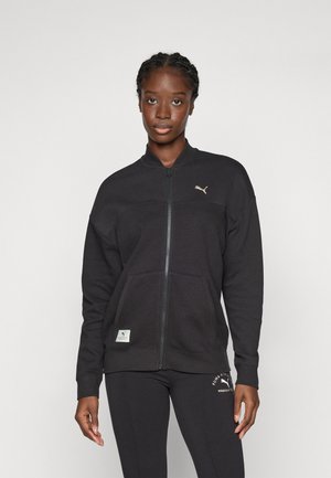 Black zip-up sweatshirt with textured fabric, featuring a stand collar, front pockets, and a gold logo accent on the left chest.