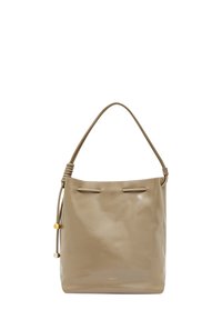 Beżowa skórzana torba typu bucket o gładkiej fakturze, regulowanym pasku na ramię, podwójnych sznurkowych zapięciach oraz małej ozdobnej koralikach.