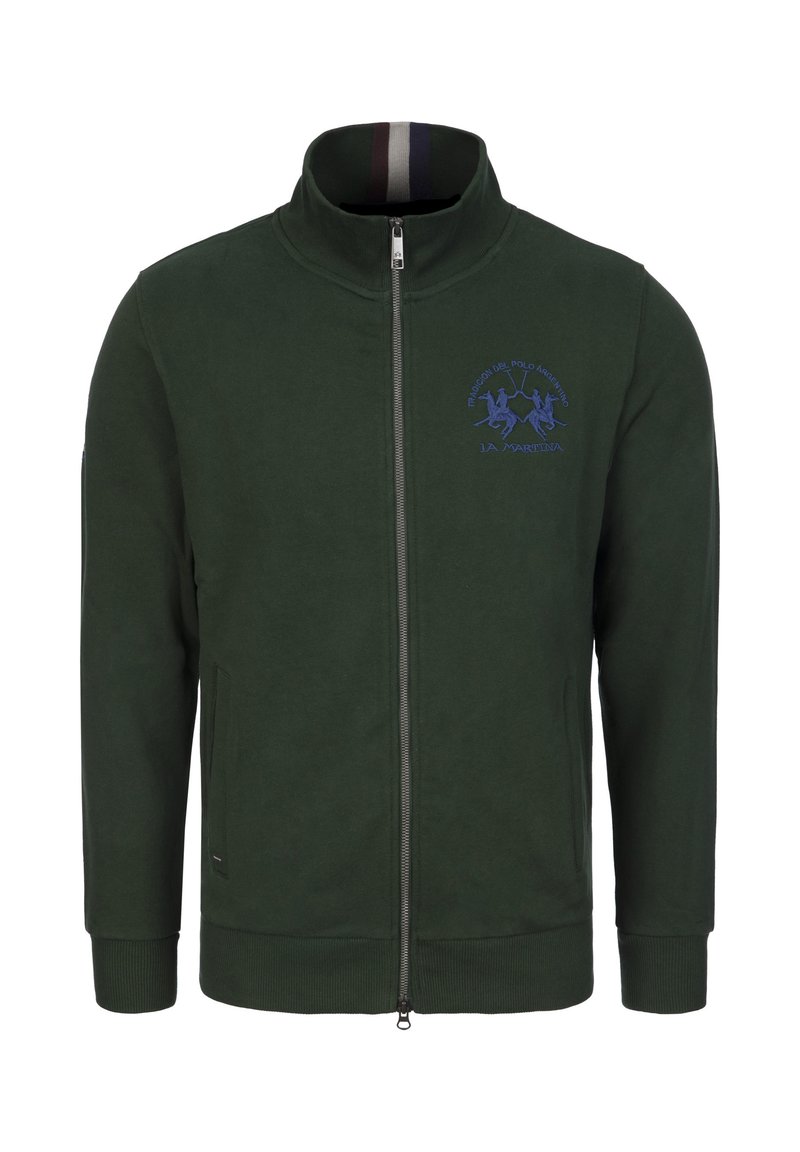 Green zip-up jacket in cotton blend, featuring a high collar, side pockets, and blue embroidered logo on the chest. Ribbed cuffs and hem.