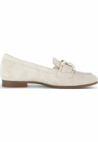 Beige suede loafer with a flat brown sole, featuring a prominent decorative buckle and a smooth finish.