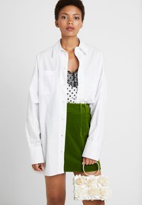 Mascara Pikkulaukku - ivory