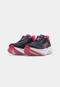Footwear featuring a dark navy upper with pink accents, a cushioned white midsole, textured outsole, and logo detail on the side.