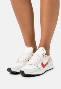 nike waffle one trainers sail gym red pearl white black