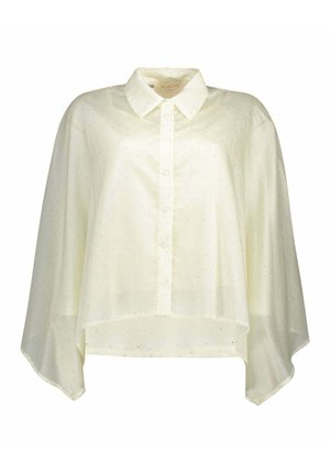 Semi-transparante ivoorkleurige blouse met knopen, puntige kraag, lange vloeiende cape-achtige mouwen en een subtiel polkadotpatroon.