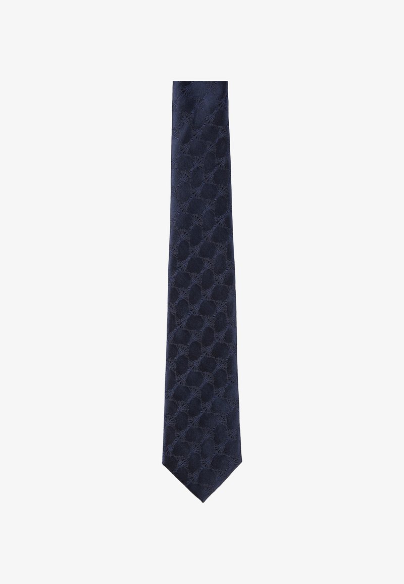 Cravatta blu navy con un motivo testurizzato di ovali sollevati. Realizzata in tessuto, presenta un'estremità appuntita e una finitura liscia.