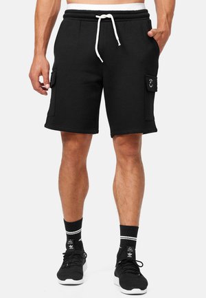 Shorts noirs en mélange de coton avec une taille élastique, un cordon blanc, des poches latérales et un détail de logo brodé sur la jambe.