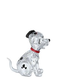 Kryštálová figúrka psa s čiernymi ušami, čiernymi škvrnami a červeným obojkom. Dizajn má hladké povrchy a fazetované okraje pre iskrenie.