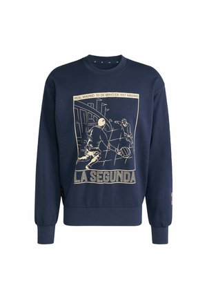 Marineblauwe sweatshirt met lange mouwen. Heeft een geïllustreerde afbeelding van voetballers en de tekst "LA SEGUNDA" in goud.