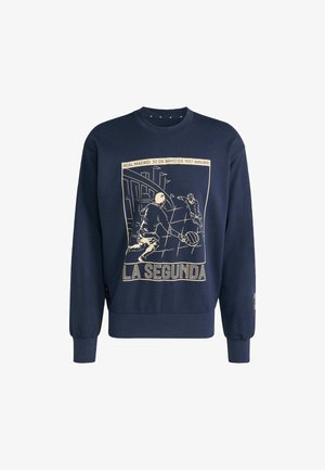 Sudadera azul marino con mangas largas. Presenta un gráfico ilustrado de jugadores de fútbol americano y el texto "LA SEGUNDA" en dorado.