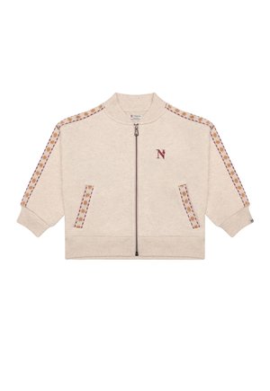 Beige jas met ritssluiting met patroon van sterrenstrepen op mouwen en zakken, geribbelde boorden en zoom, en een klein kastanjebruin "N" logo op de borst.