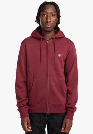 Maroon zip-up hoodie with a drawstring hood, front pockets, and ribbed cuffs. Features a small logo in white on the chest.