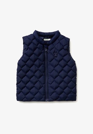 Veste sans manches matelassée bleu marine avec fermeture éclair à l'avant et logo brodé discret sur la poitrine gauche.