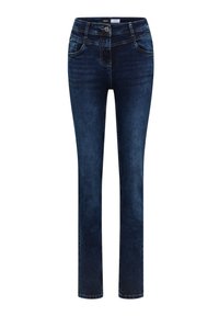 Jeans slim bleu foncé avec poches avant, passants de ceinture, fermeture par boutons et légère décoloration aux cuisses et genoux.