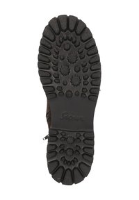 Suola nera in gomma di un boot con un pattern testurizzato che presenta grip variabili e un logo. Il design include forme arrotondate e angolari.