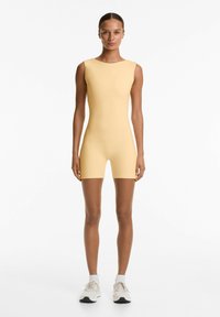 OYSHO EVERMOVE SHORT - Jumpsuit - yellow