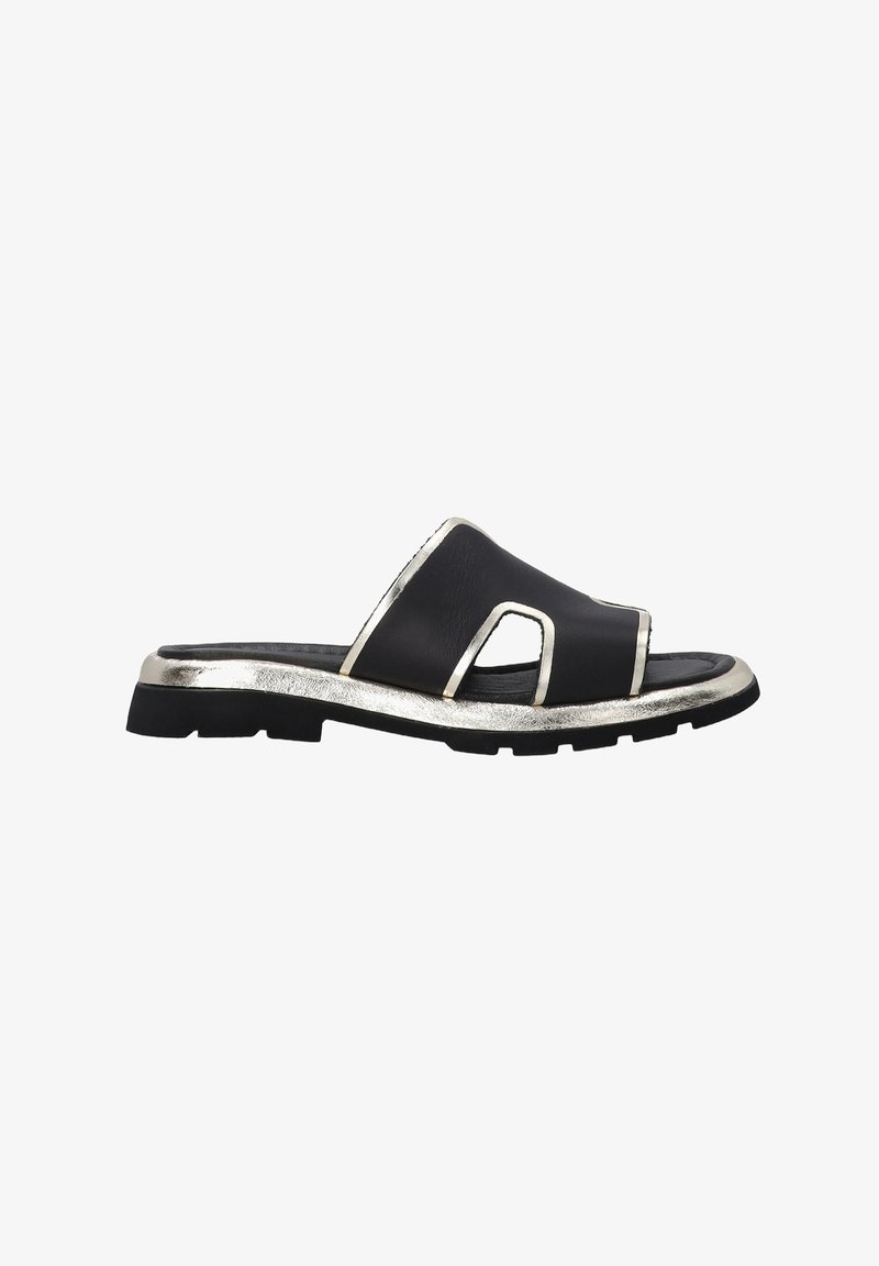 Black leather slide sandal featuring a metallic silver accent along the sole and a bold cutout design. Textured black rubber outsole.