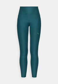Leggings atléticos em azul-petroleo com um cós alto, feitos de material elástico. Apresentam um pequeno logótipo na parte inferior da perna direita e costuras planas.