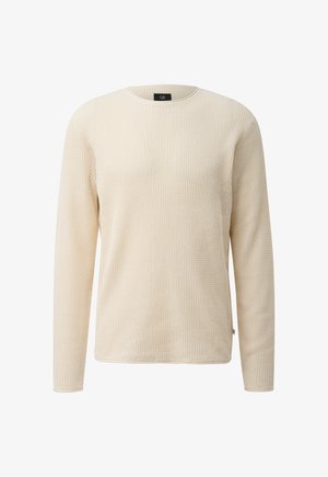 Krēmkrāsas ilgrokains adīts džemperis ar raksturīgu vafeļu rakstu un apaļu kakla izgriezumu, attēlots uz vienkrāsaina balta fona.