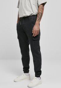 Urban Classics - KNITTED CARGO JOGGING PANTS - Cargo trousers - black Thumbnail Image 1