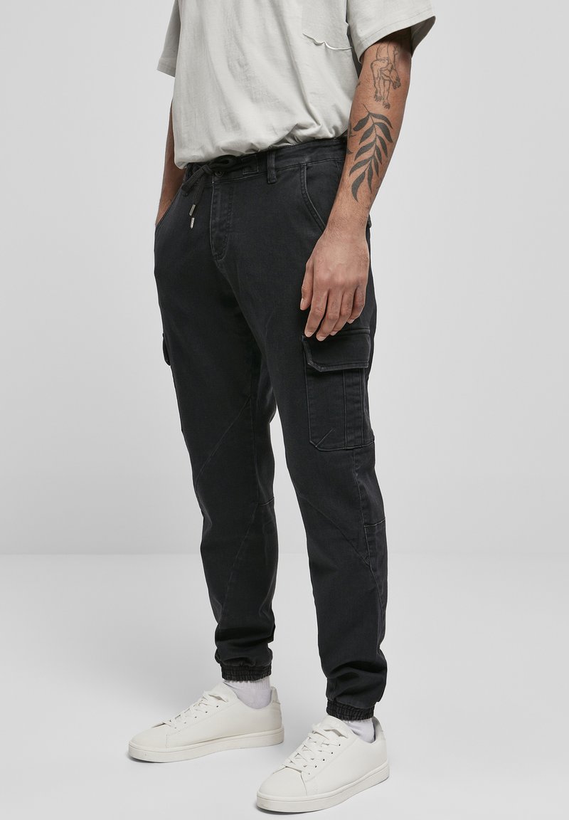 Urban Classics KNITTED CARGO JOGGING PANTS - Cargo trousers - black