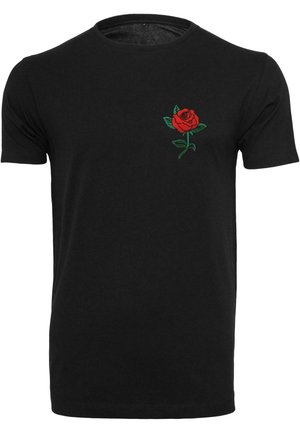 Black cotton t-shirt featuring a red rose graphic on the left chest area. Short sleeves, crew neckline, smooth texture.