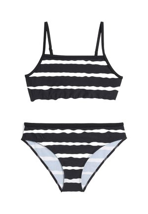 Costume da bagno a strisce bianche e nere composto da un top corto con spalline sottili e un fondo coordinato, realizzato in un morbido tessuto elastico.