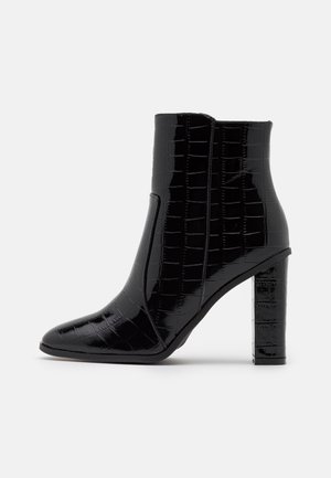 High heeled ankle boots - black