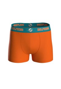 Bóxer naranja con cintura turquesa que presenta el texto "Delfines" y un logo. Textura suave y diseño ajustado.