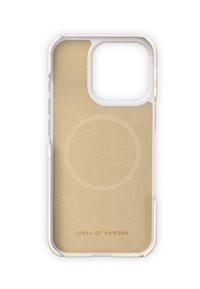 Przezroczysta obudowa na telefon z beżowym wnętrzem i zaokrąglonymi rogami. Zawiera tekst "IDEAL OF SWEDEN" wytłoczony na dole.